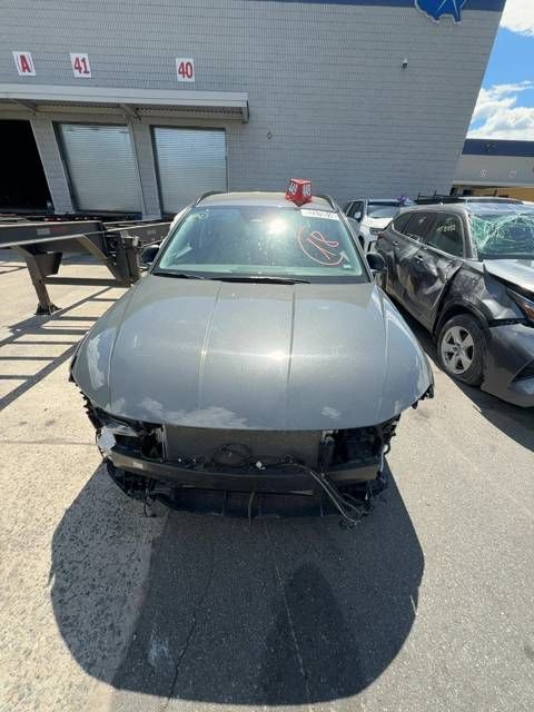 52370516