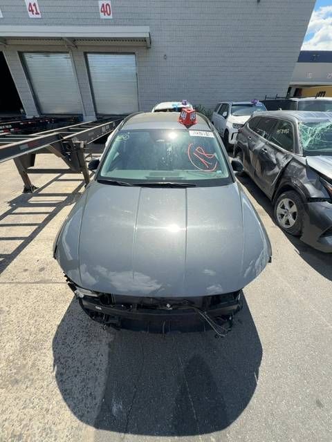 52370516