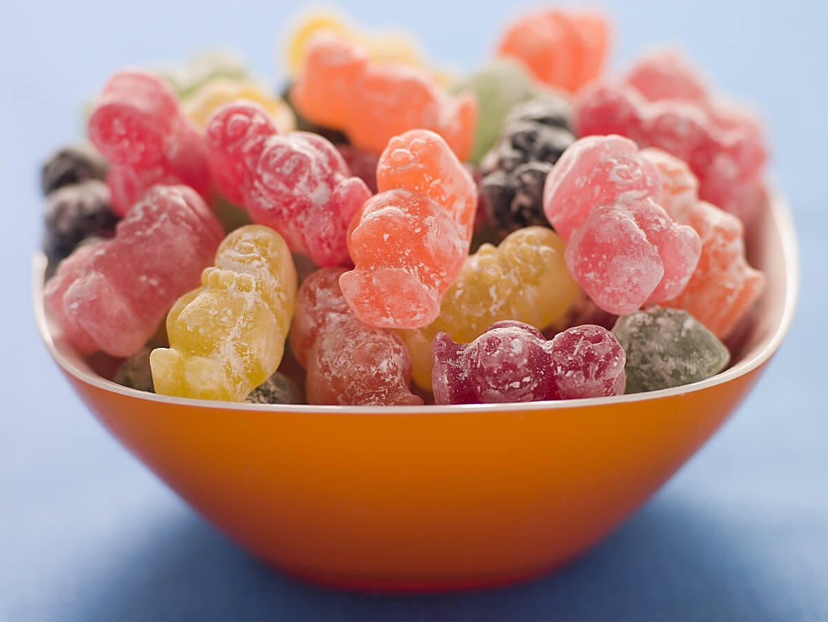 An orange bowl filled with Jelly Babies