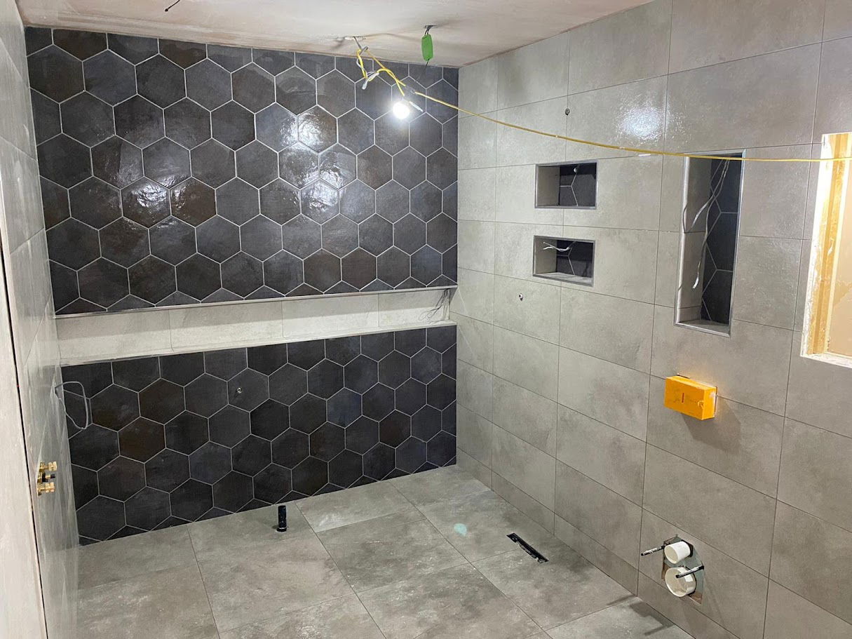 Hexagon wall tiling by Hunter Tiling Ltd in Goffs Oak
