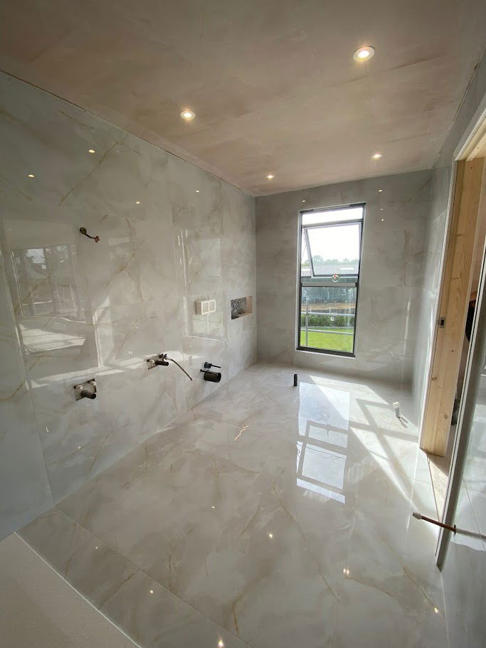 Mitred niches with colour matched resins for the exquisite en suite in Bishops Stortford, Essex