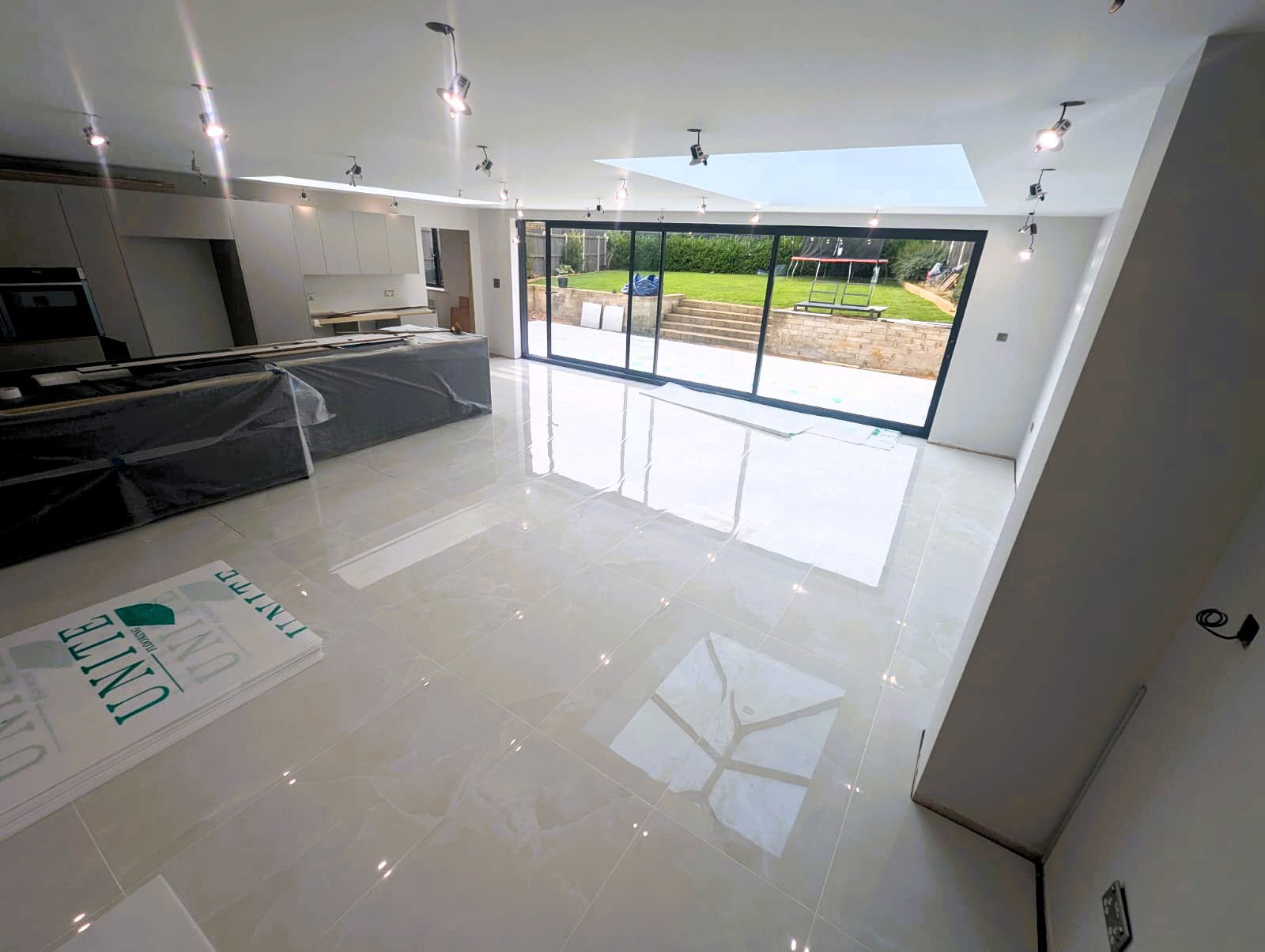 Polished Porcelain extension floor tiling in Bishops Stortford