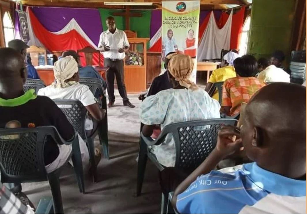 A trainer training participants of our project in Nyando