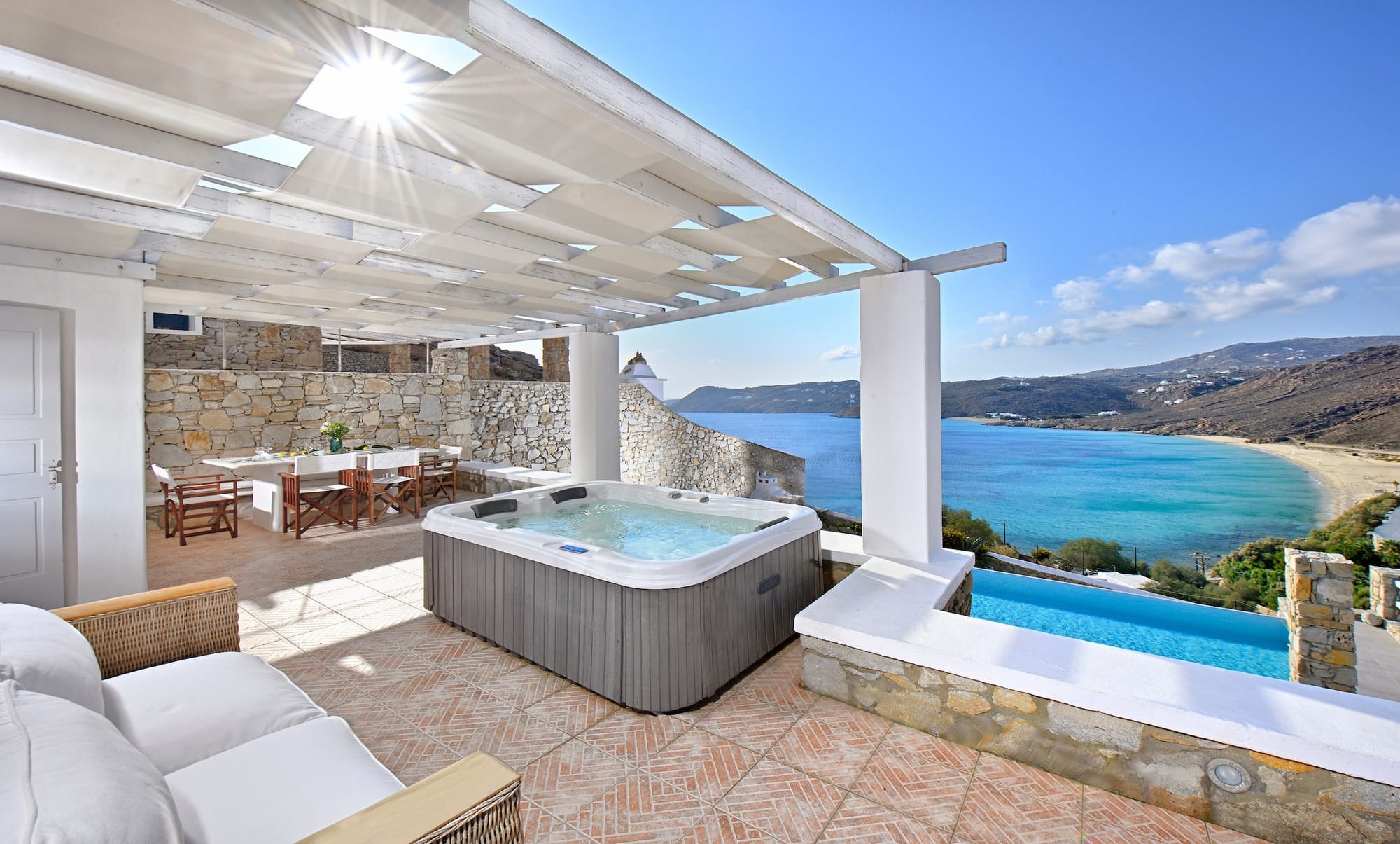 Villa Ostria – Jacuzzi with a Beach View