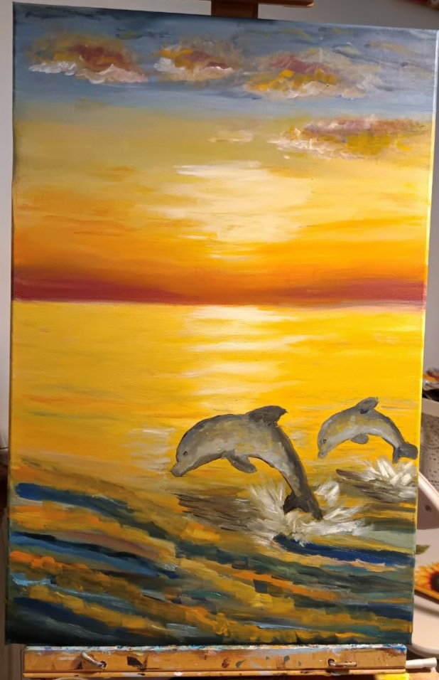 DELFINI AL TRAMONTO