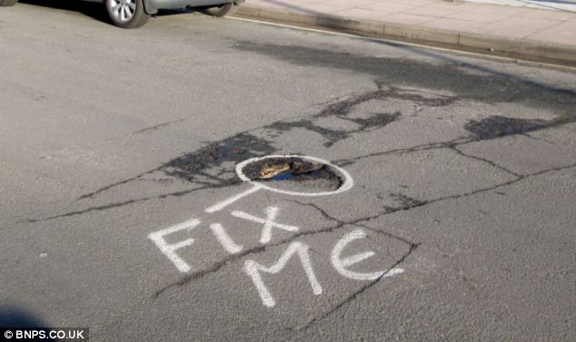 Pothole Palooza: When the Road Gets Rocky, Get Your Protest On!