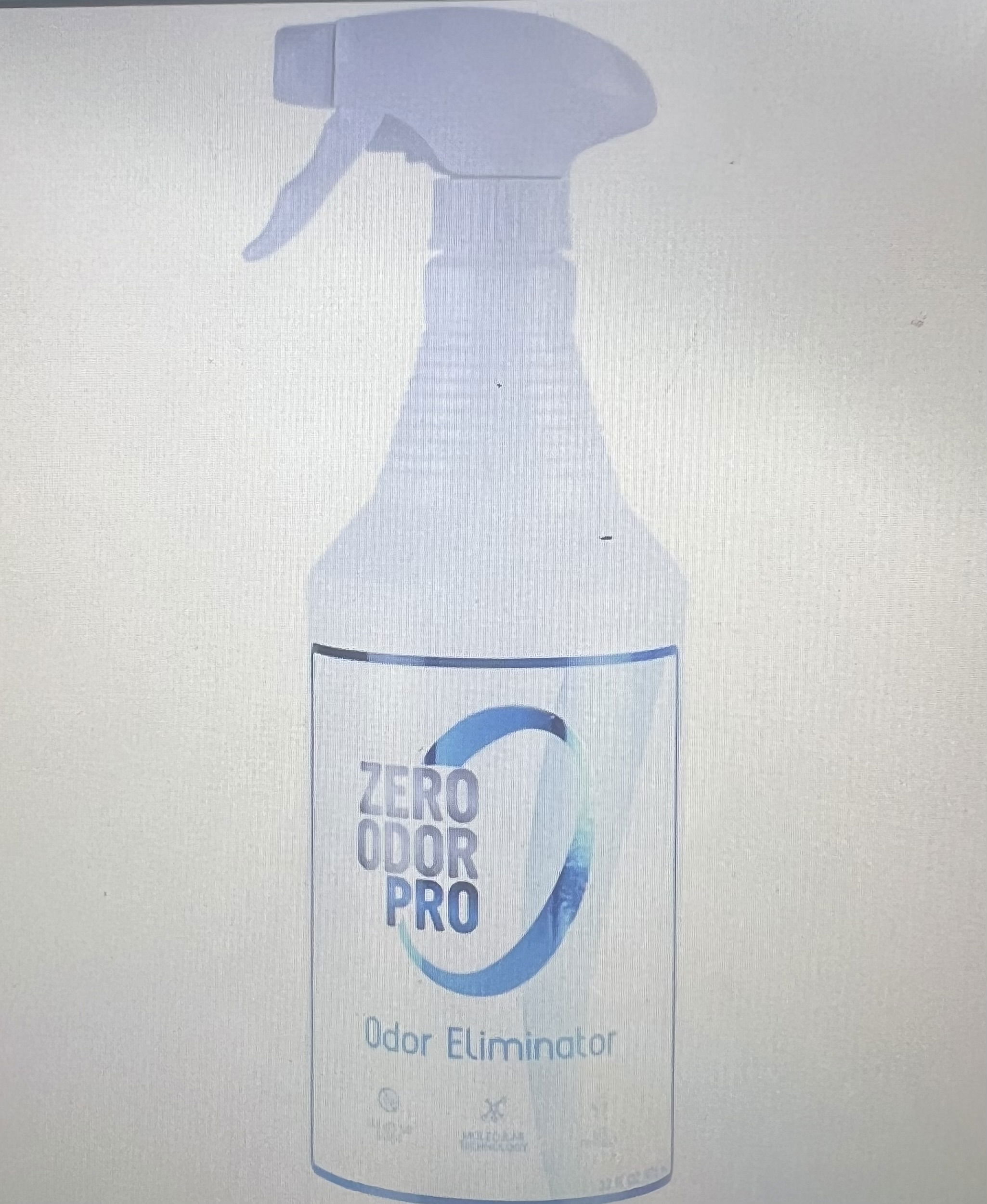 A white spray bottle of Zero Odor Control. Blue writing on the label.