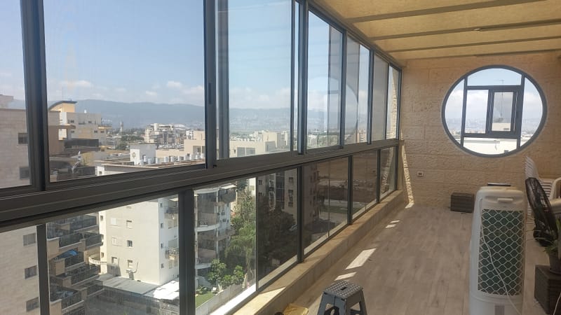 פרויקט מורכב בקרית אתא: ציפוי חלונות לפנטהאוז