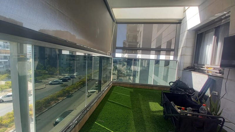 מרפסת שמש בלוד – ציפוי מעקה זכוכית ננו-קרמי 5%