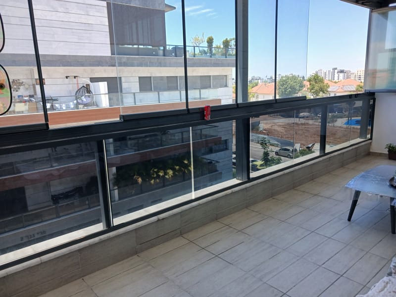 ציפוי חלונות למרפסת שמש גן יבנה ננוסרמי 5% פרטיות מלאה