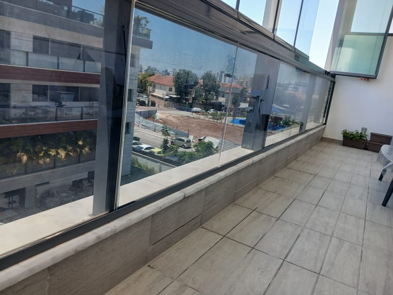 ציפוי חלונות למרפסת שמש גן יבנה ננוסרמי 5% פרטיות מלאה