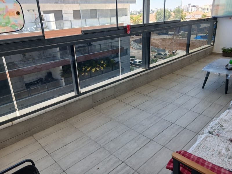 ציפוי חלונות למרפסת שמש גן יבנה ננוסרמי 5% פרטיות מלאה
