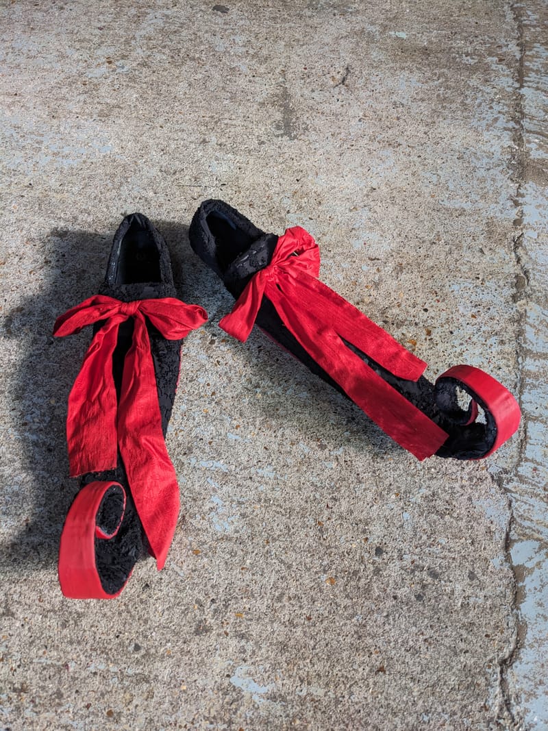 Shoes "they are incredibly long and curly"