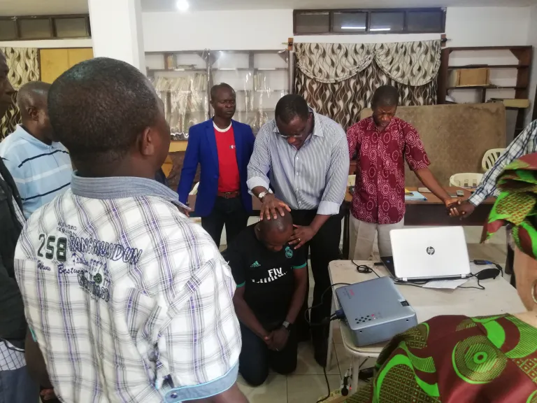 Dr. Eloi commissioning elders in Conakry, Guinea