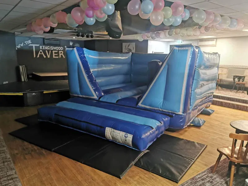 Indoor blue bouncy castle