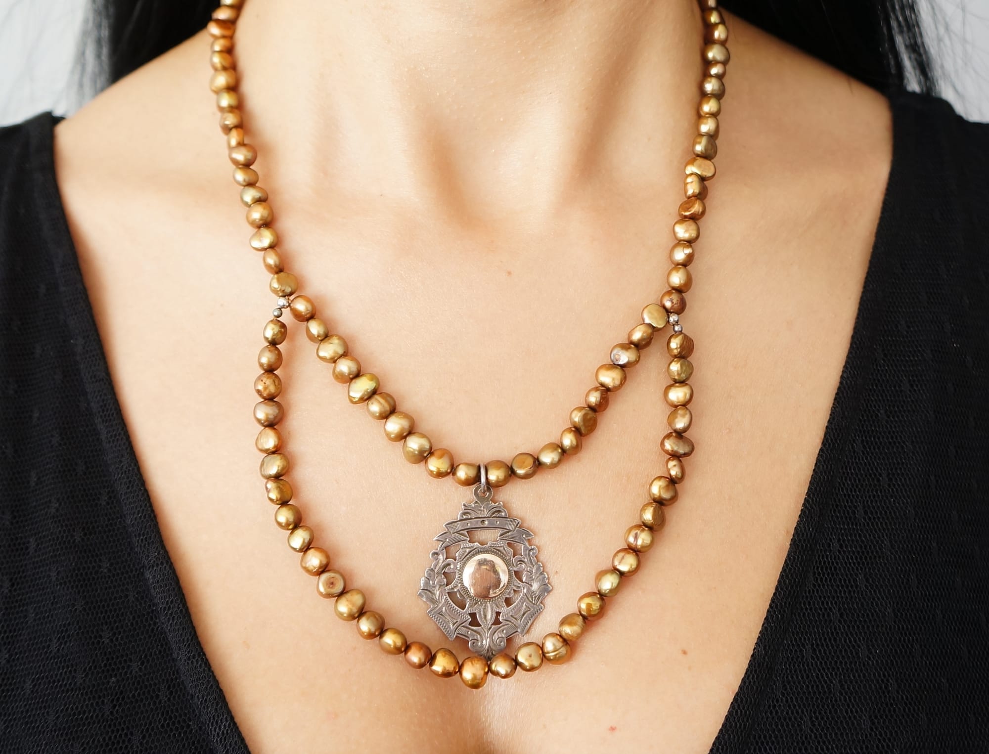 Bronze pearls with sterling silver antique pendant