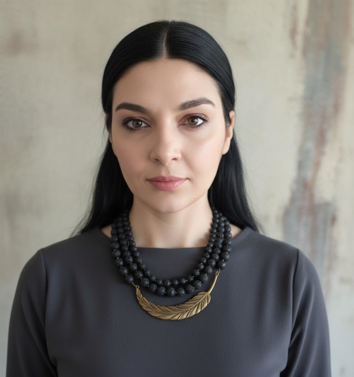 Lava beads with brass pendant