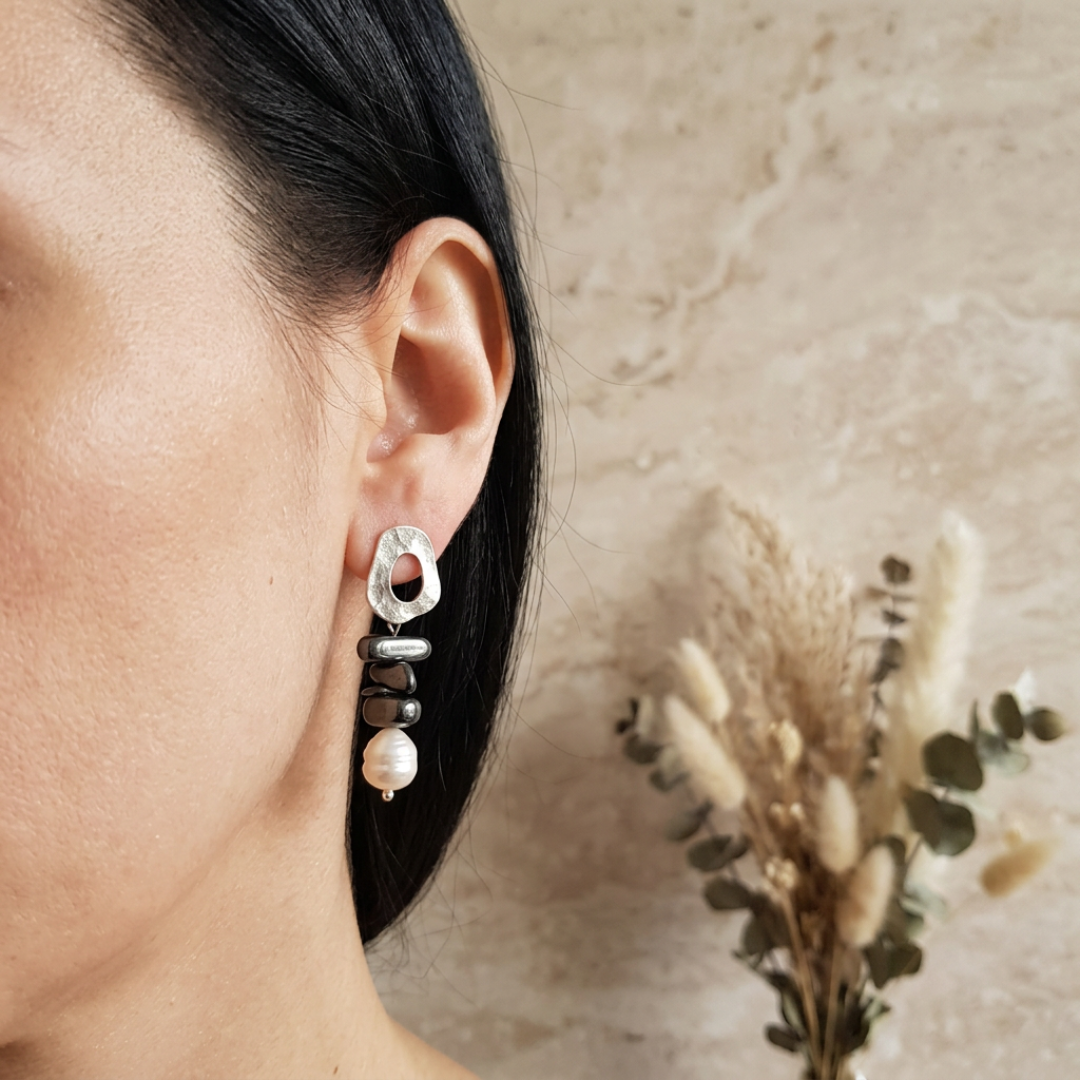 Hematite and pearl on gold-plated studs