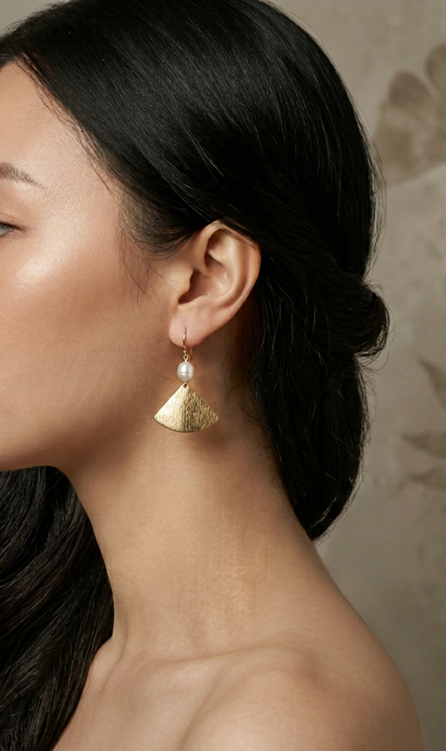 Freshwater pearls and gold-plated elements