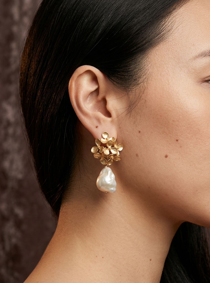 Floral gold stud earrings with baroque pearls