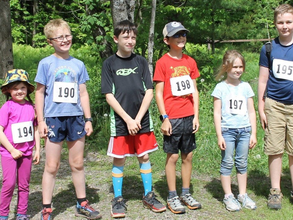 Children wearing race numbers