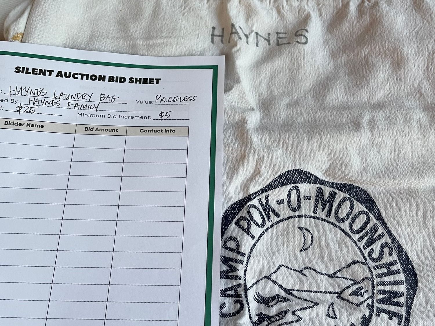 A Pok-O laundry bag with Haynes written on it as part of the silent auction