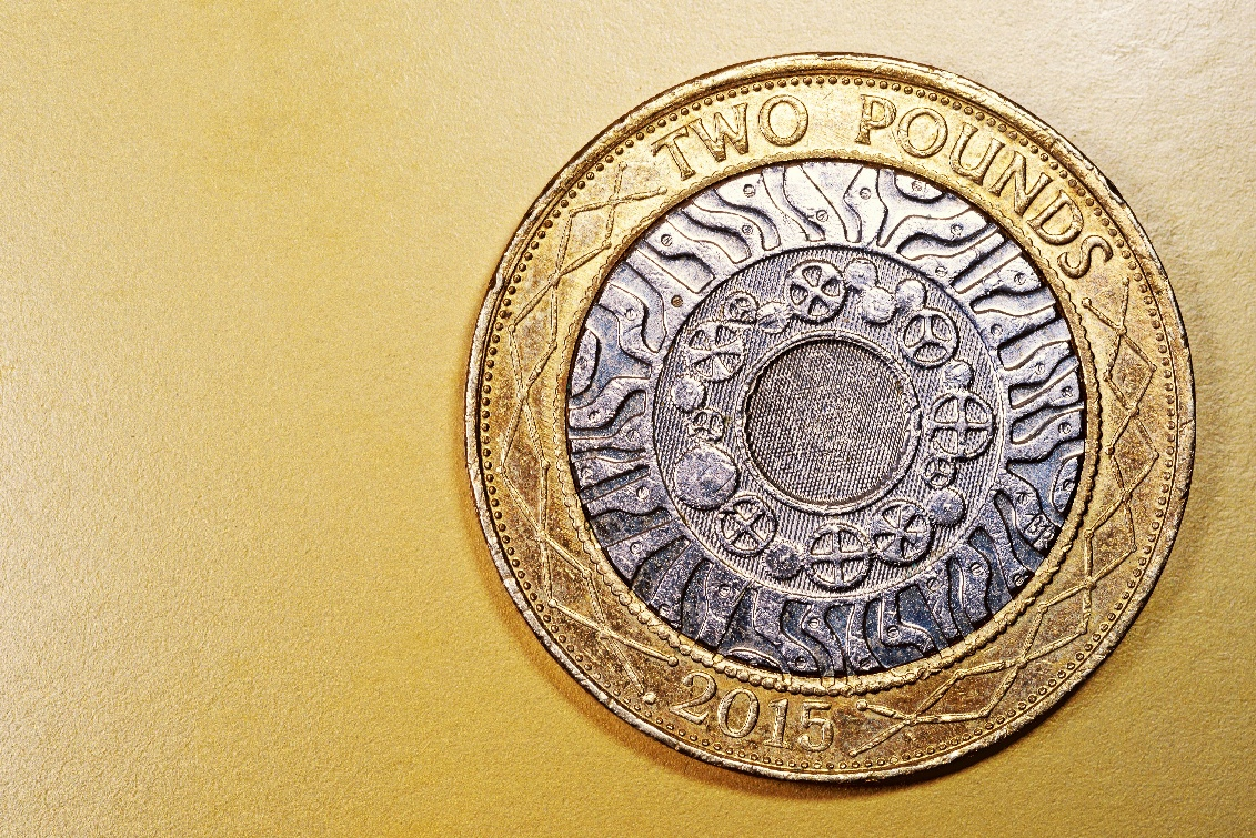 A two-pound coin, used to explain a jointly owned home before severance.