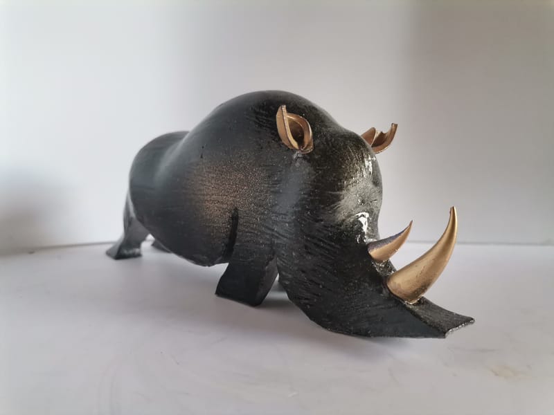 RHINOCEROS classique vieux bronze