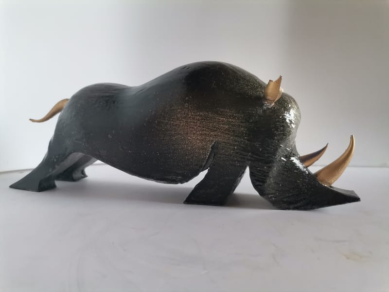 RHINOCEROS classique vieux bronze