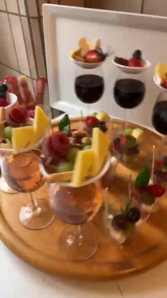 A variety of finger food on a wooden board