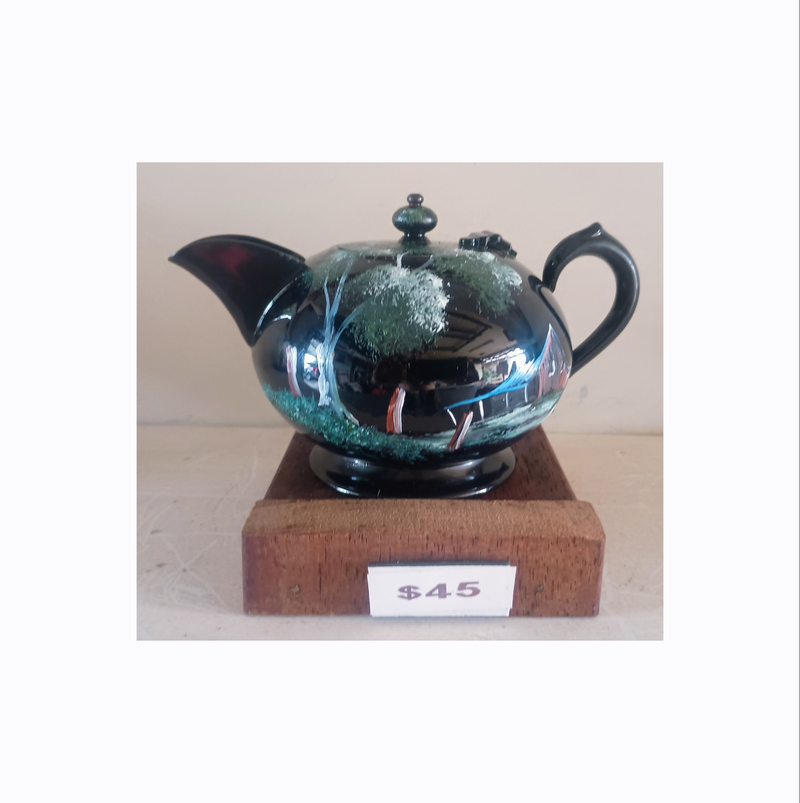 12. Teapot, Silver.  $45