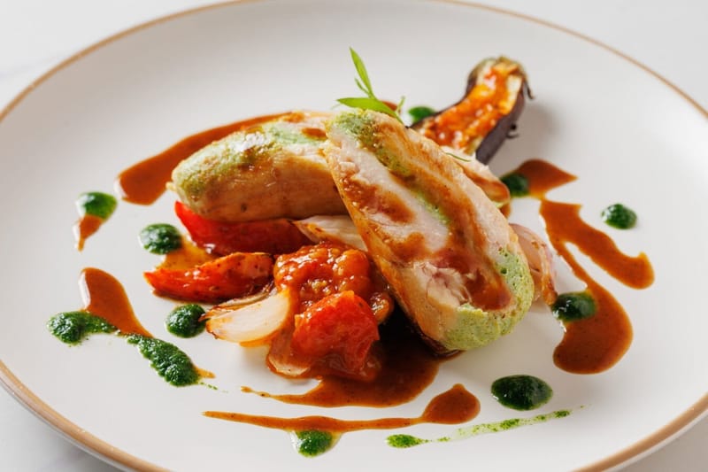 stuffed Chicken Breast, provencal garnish, onion, eggplant, tomato