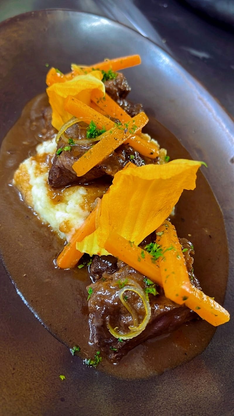 beef cheeks stew in red wine sauce, glazed carrots