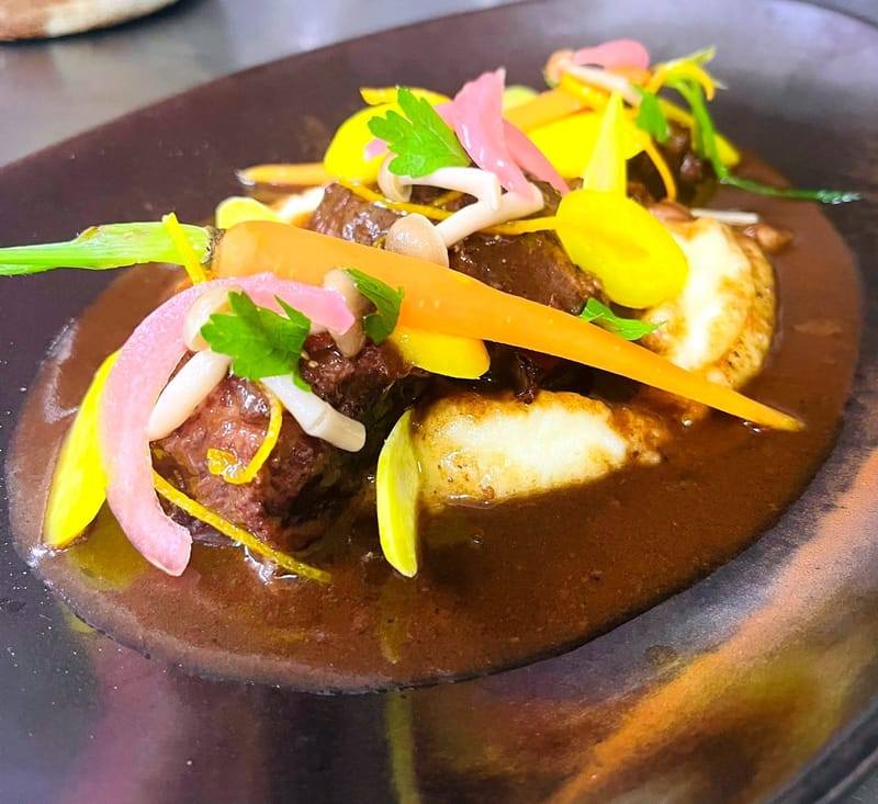 beef cheeks stew in red wine sauce, glazed carrots