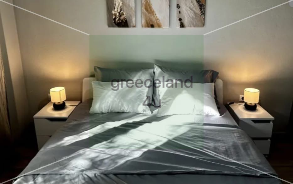 A bright and airy apartment located in the touristic area of Neos Kosmos.