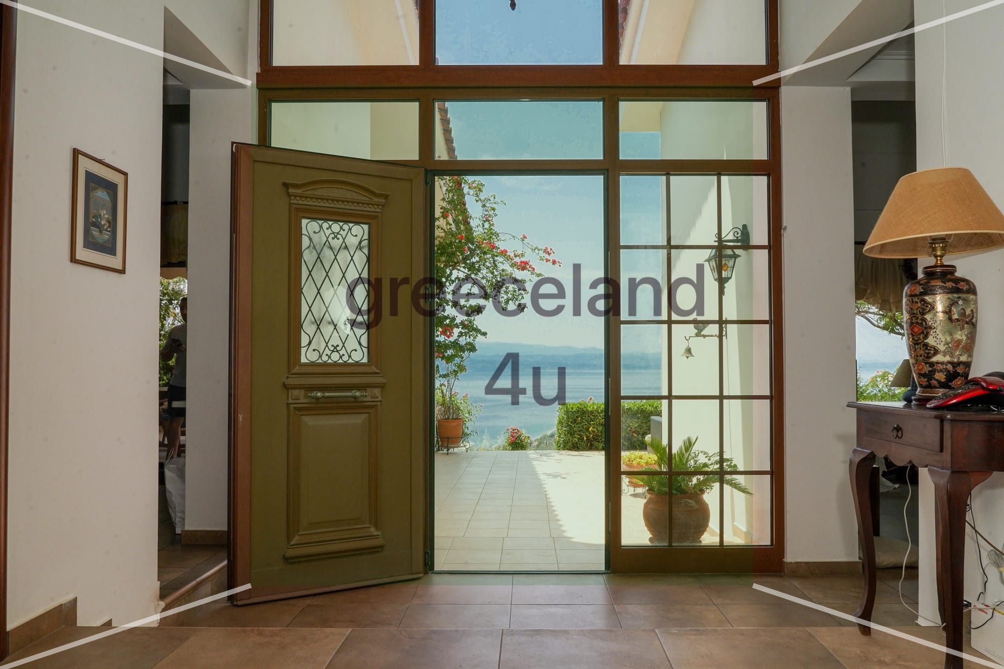 Located on a private 4,000 m² plot with stunning panoramic sea views over the Euboean Gulf.