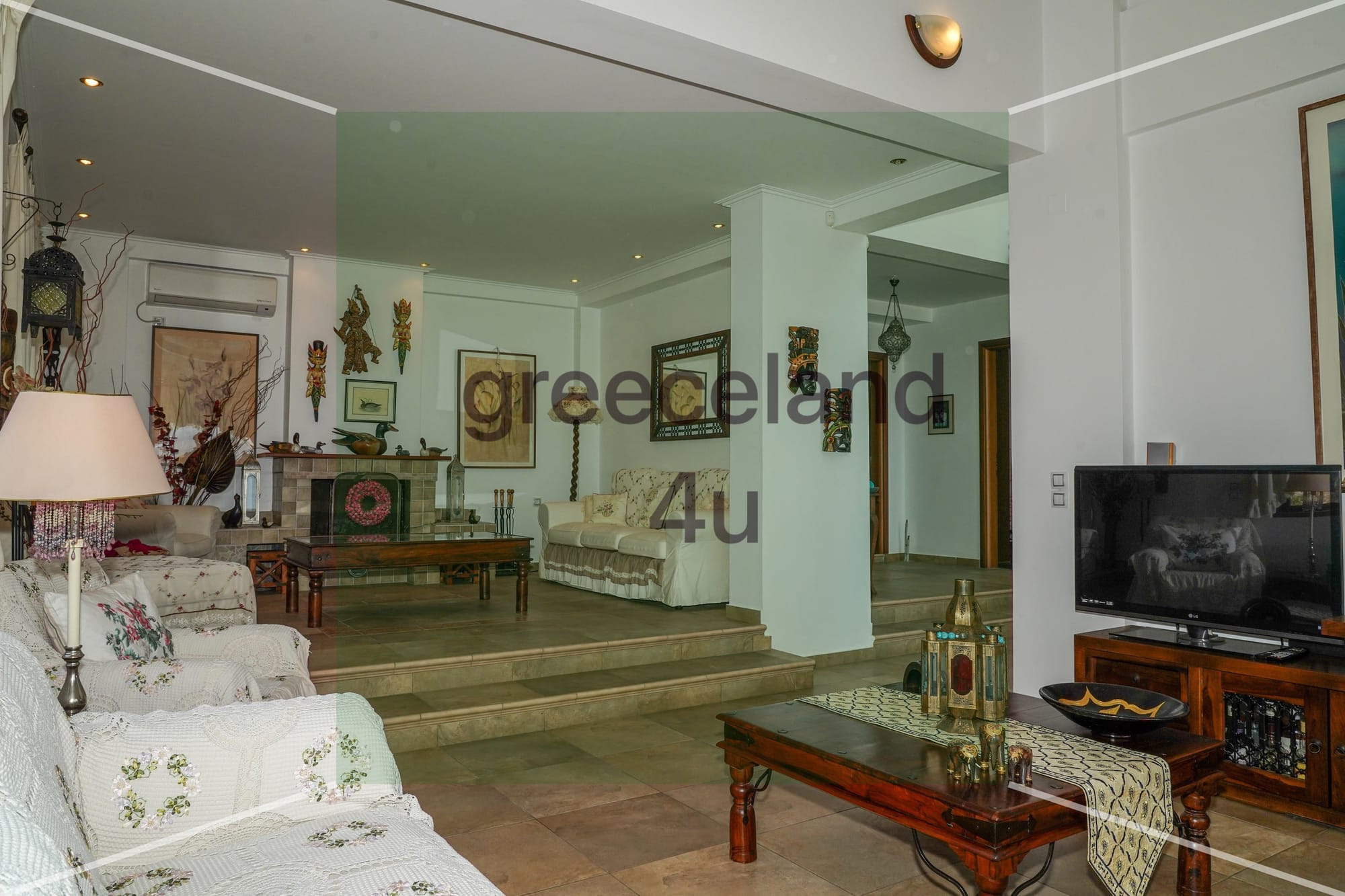 Located on a private 4,000 m² plot with stunning panoramic sea views over the Euboean Gulf.