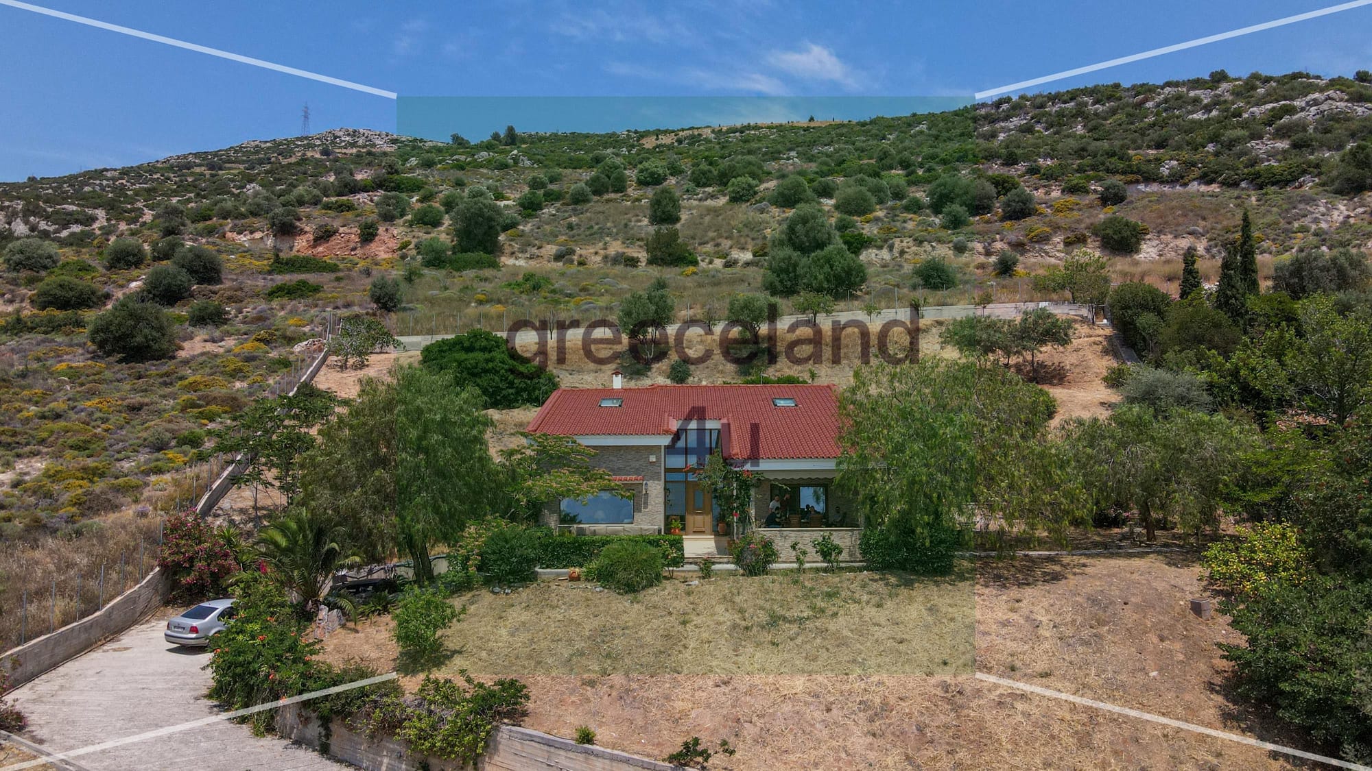 Located on a private 4,000 m² plot with stunning panoramic sea views
