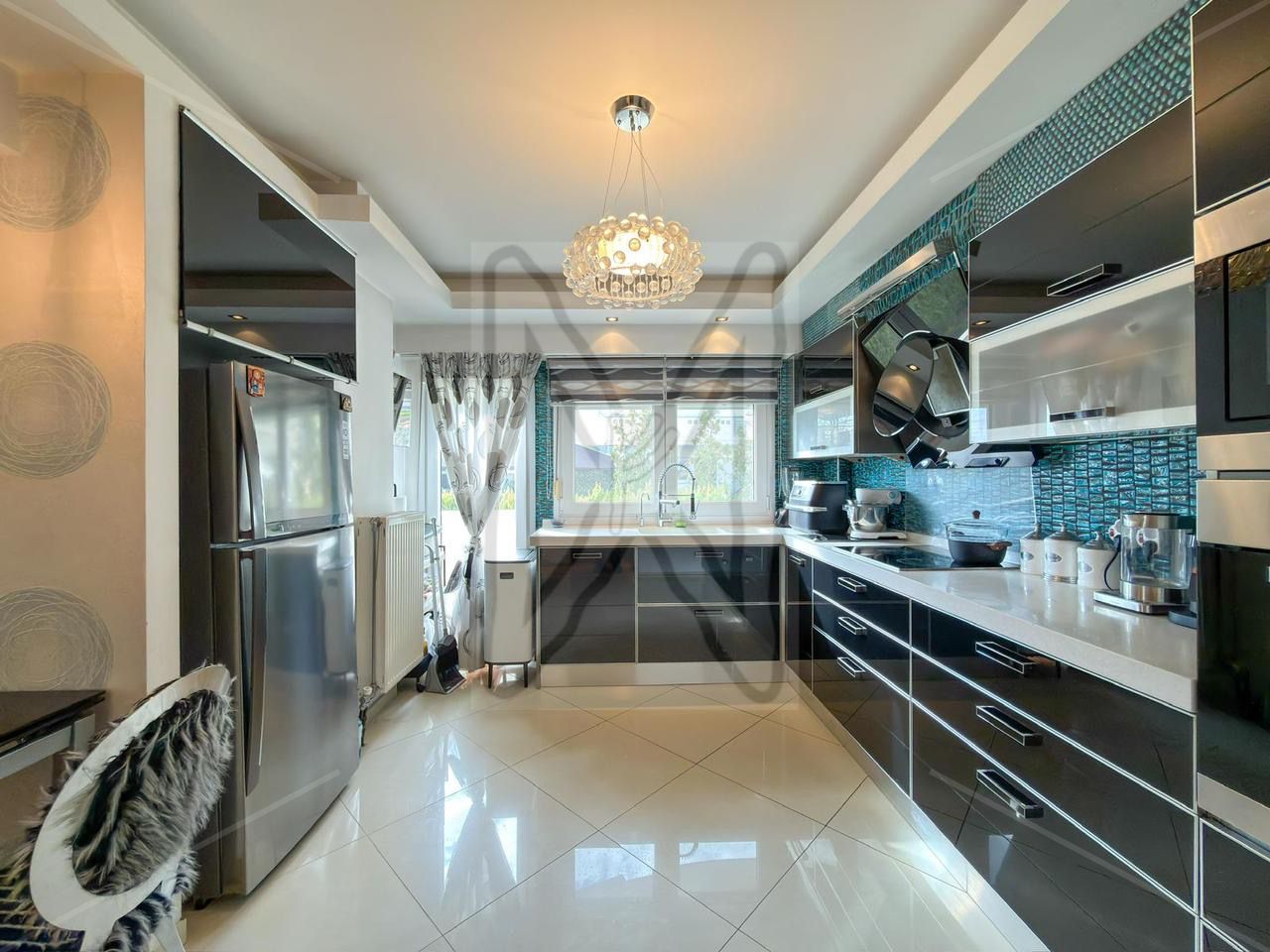 A private four-level residence located in one of the most prestigious and secure areas of Thessaloniki.