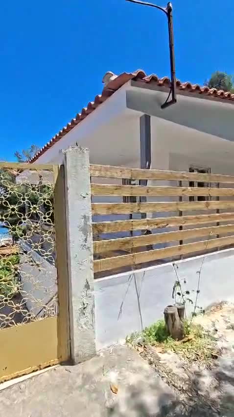 Coastal Living in Oropos: Private Pool Home with Stunning Sea Views