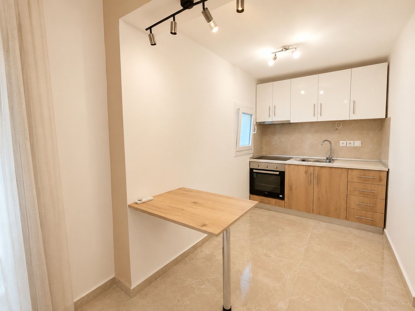 A 30 m² apartment with a private balcony,
