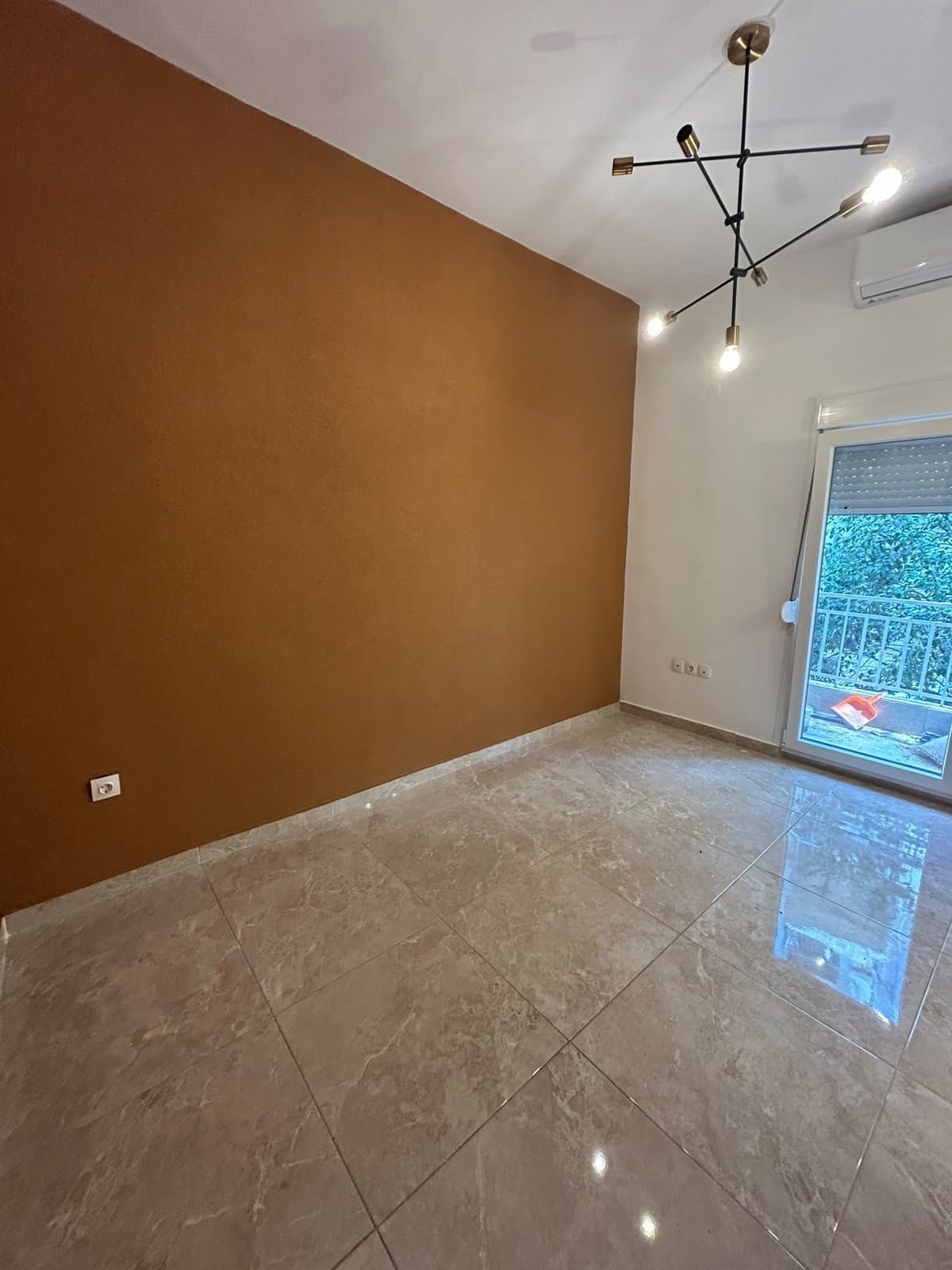 A 30 m² apartment with a private balcony,