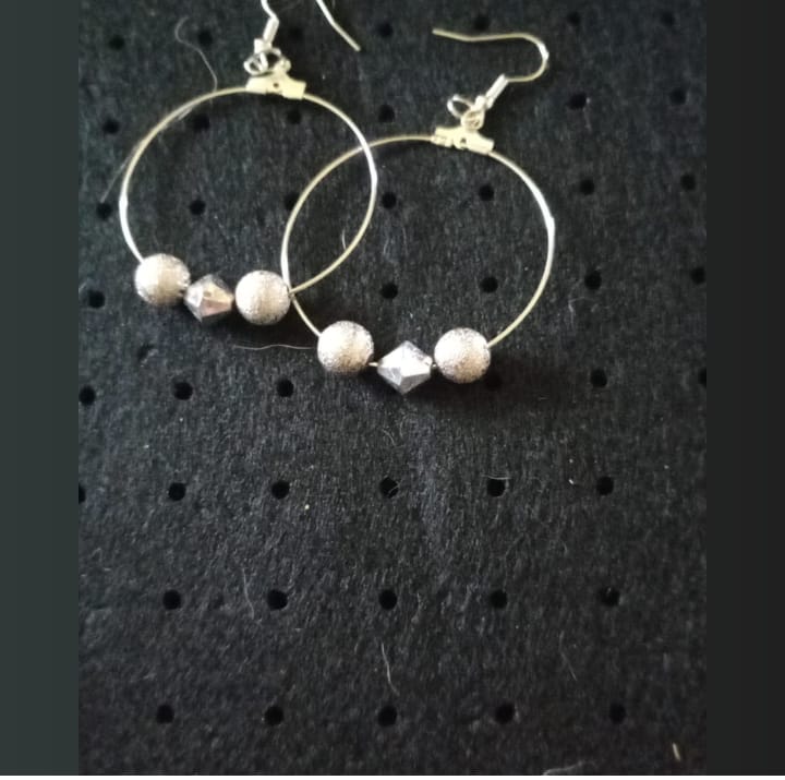 Silver Harmony: Beaded Dangle Earrings - R220.00