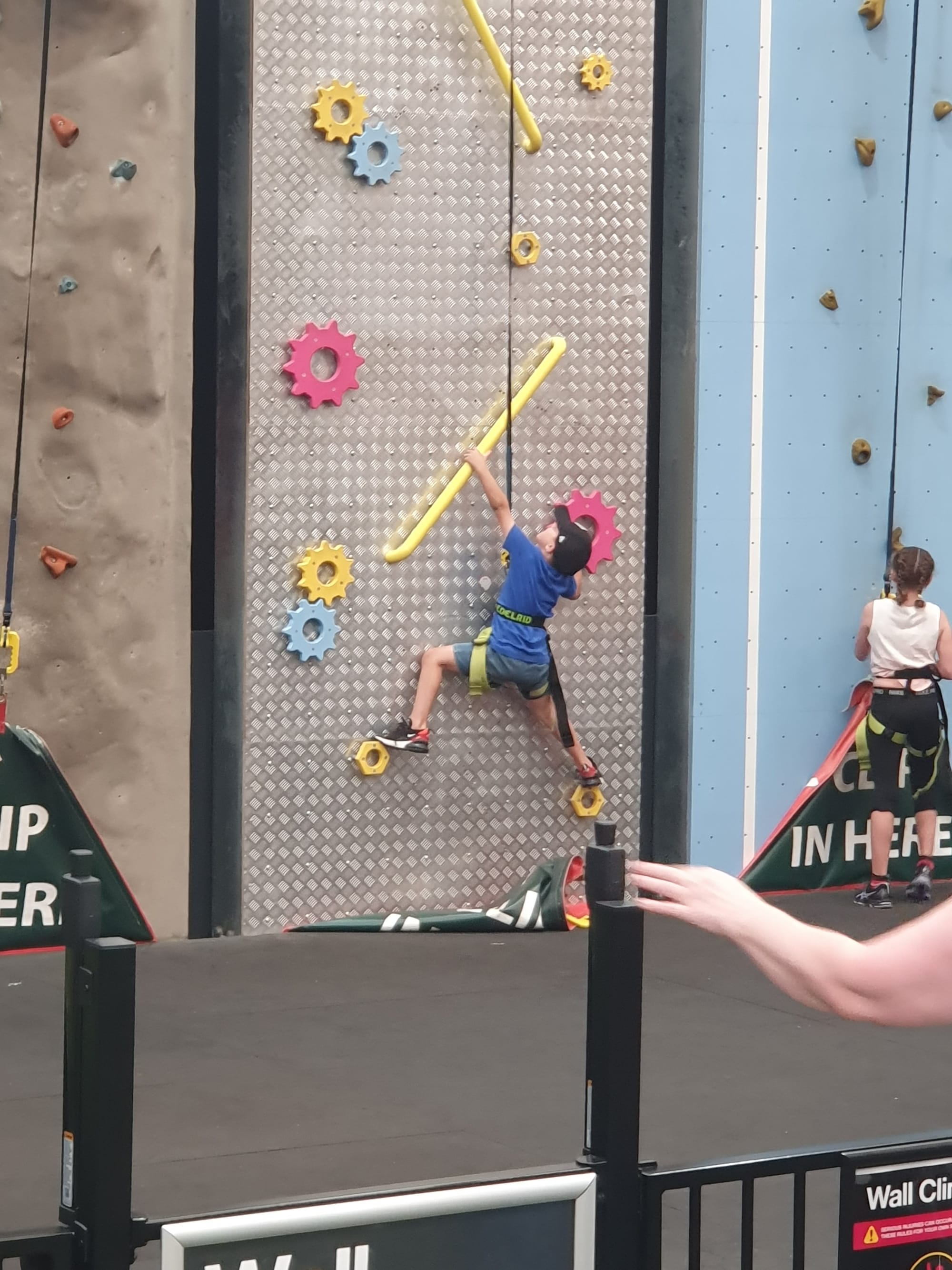 Tate having a crack at the rock climbing walls at BOUNCE Greenacres SA