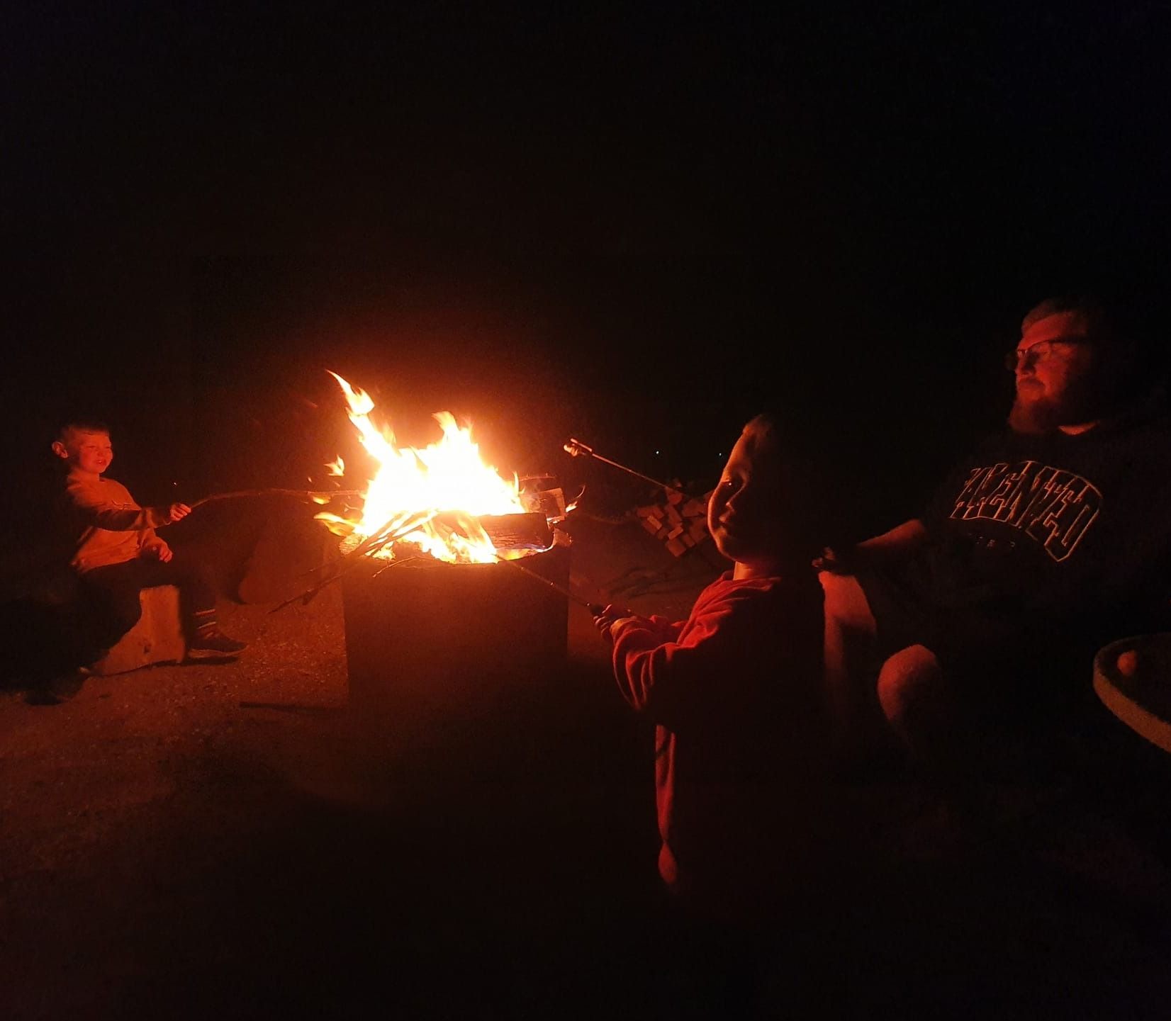 Roasting marsh mellows by the fire