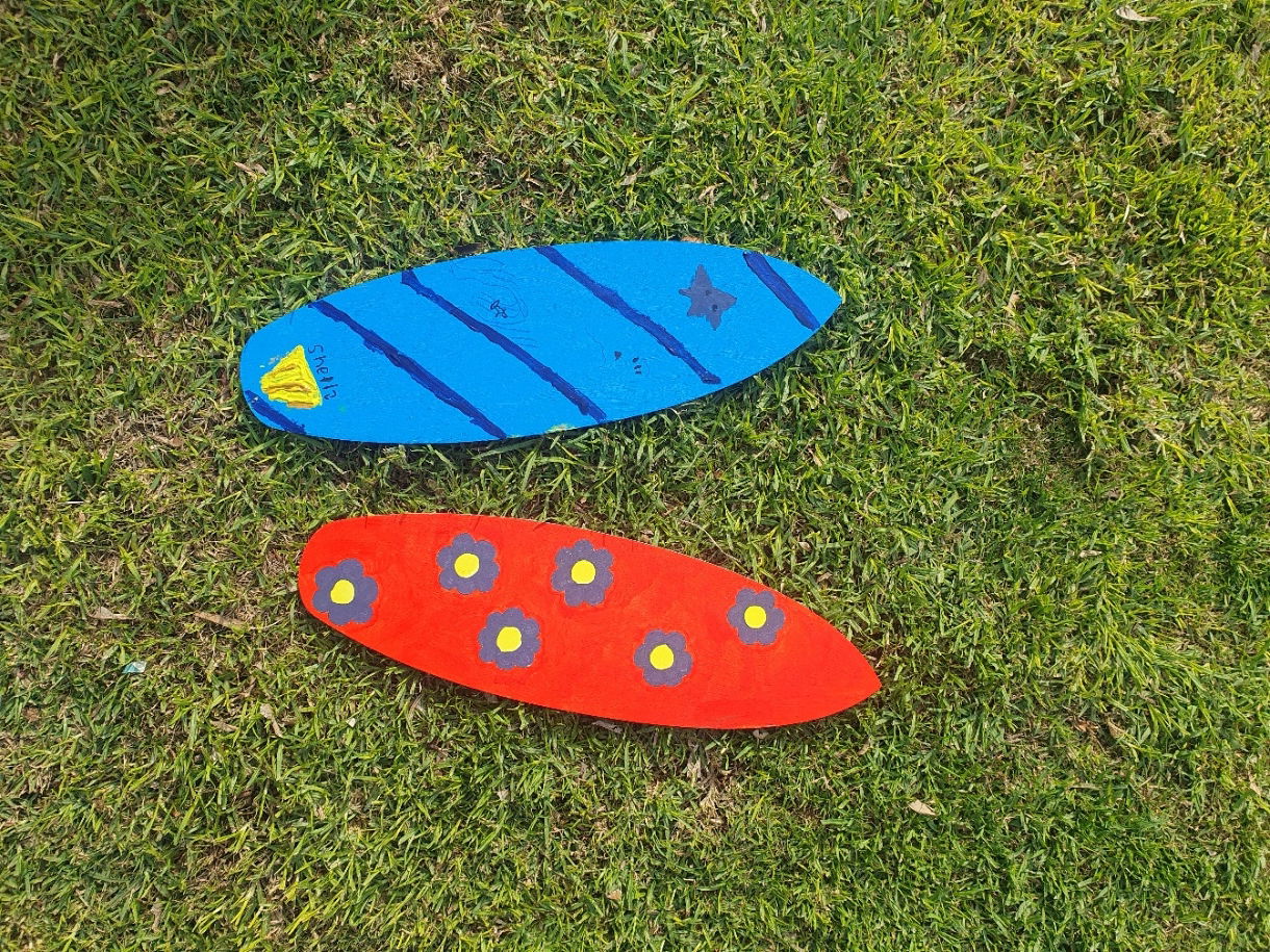 Painting our own surfboard wall hangings!
