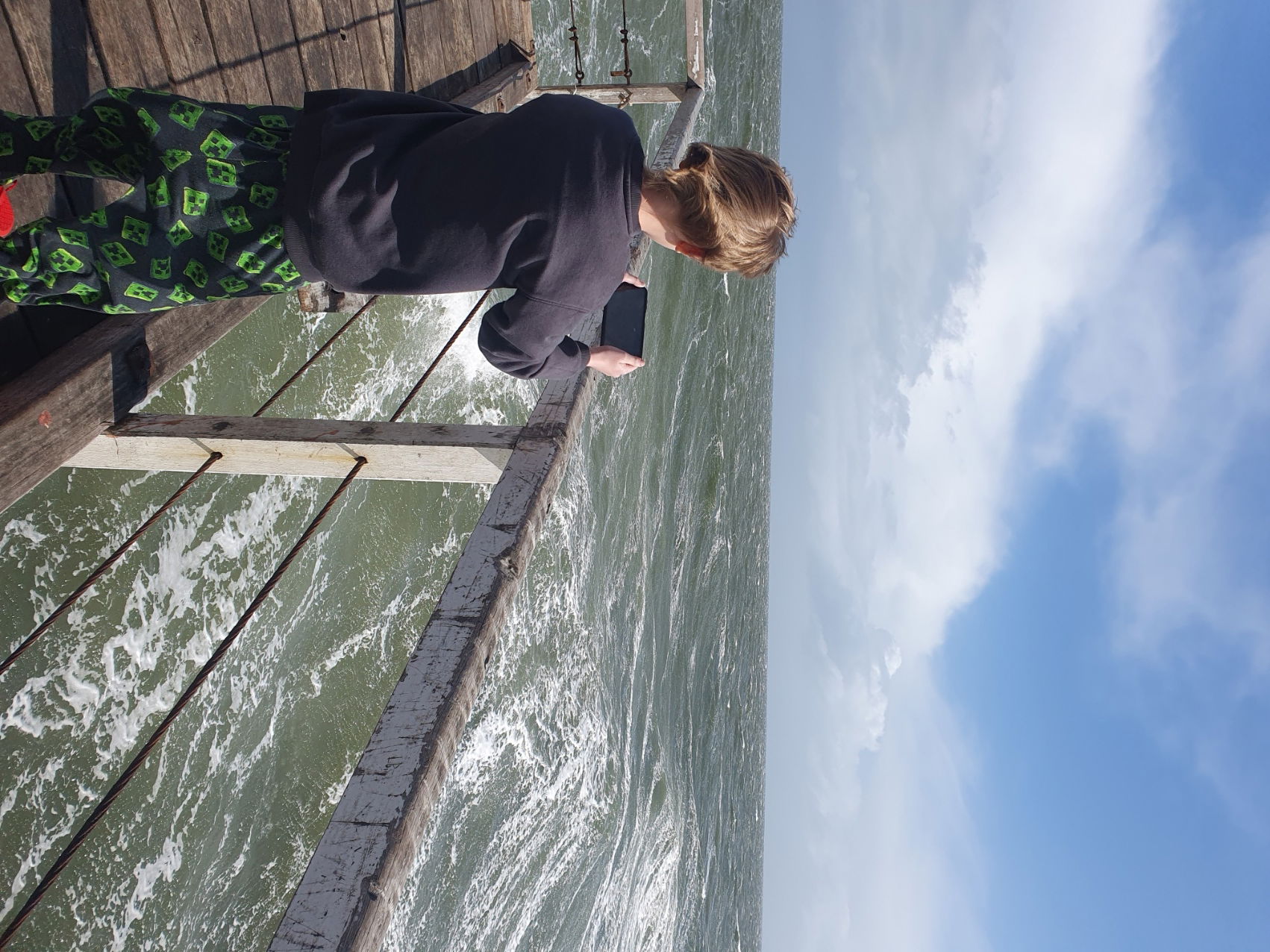 Ashton checking out the surf at Semaphore