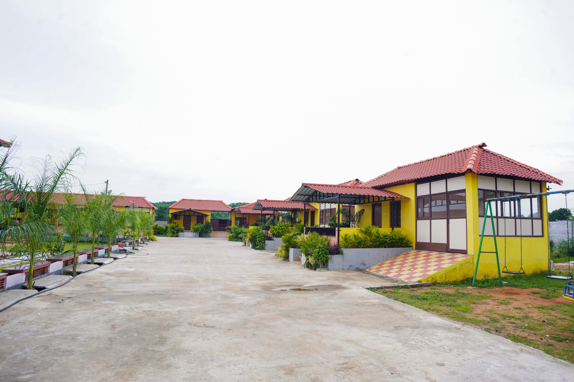 COTTAGES,LAWN AND POOL