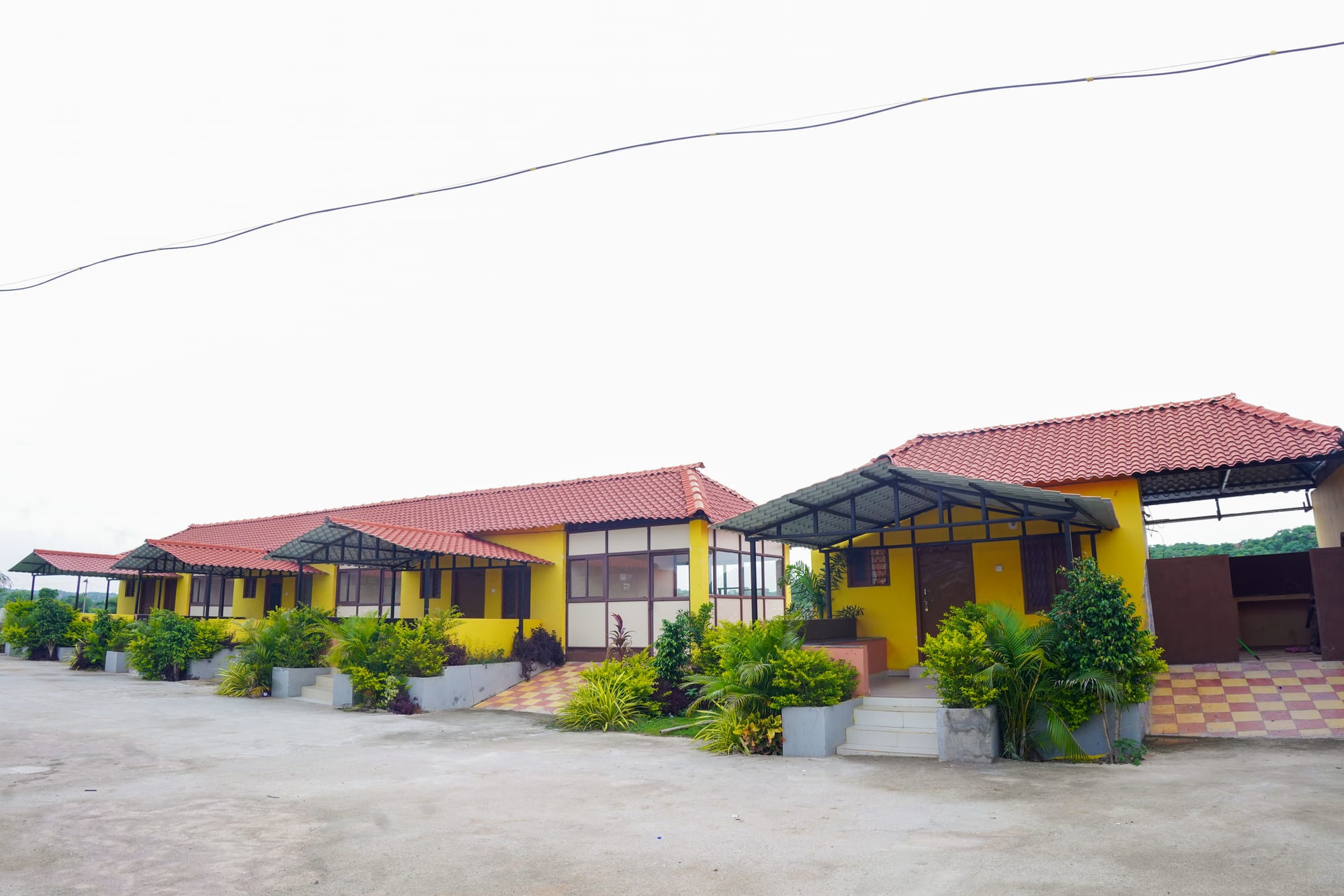 COTTAGES,LAWN AND POOL