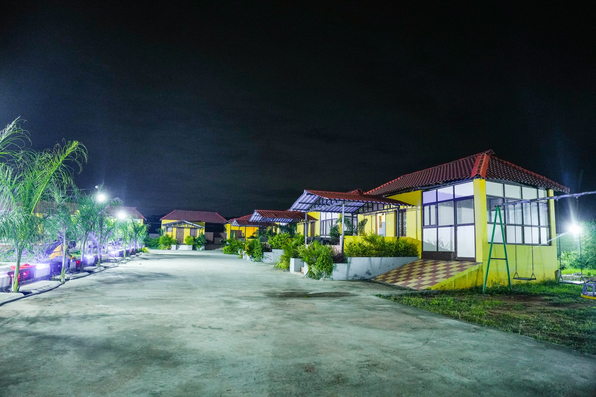 COTTAGES,LAWN AND POOL